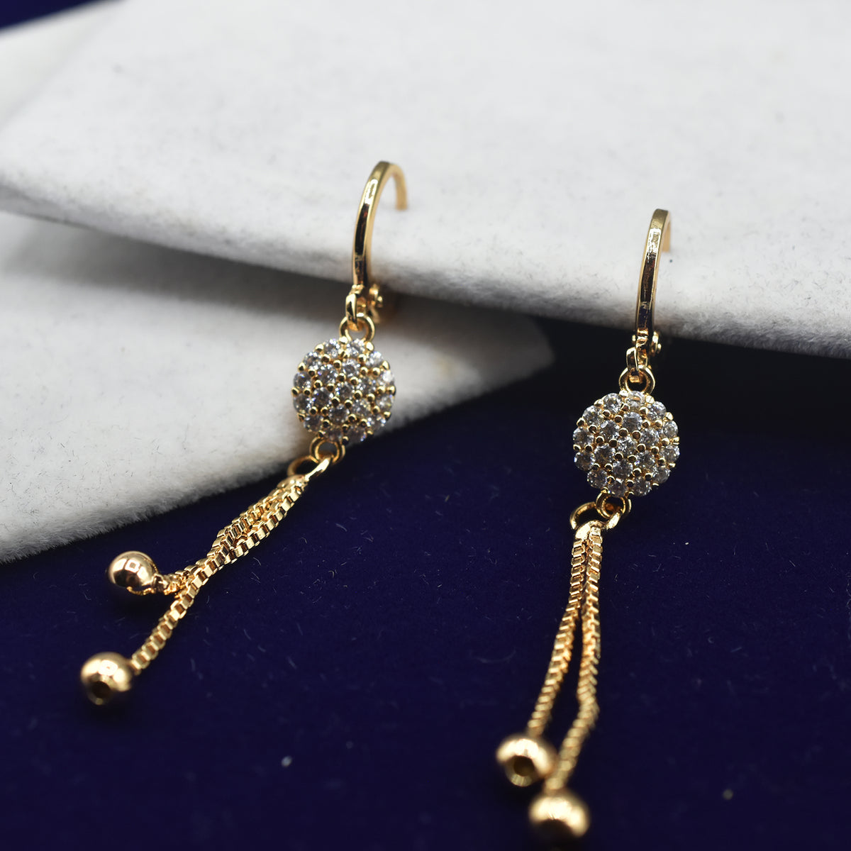 Long hot sale gold earrings