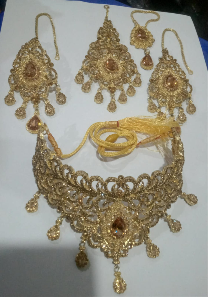 Gold plated Artificial Jewllery necklace Earrings and Tika set