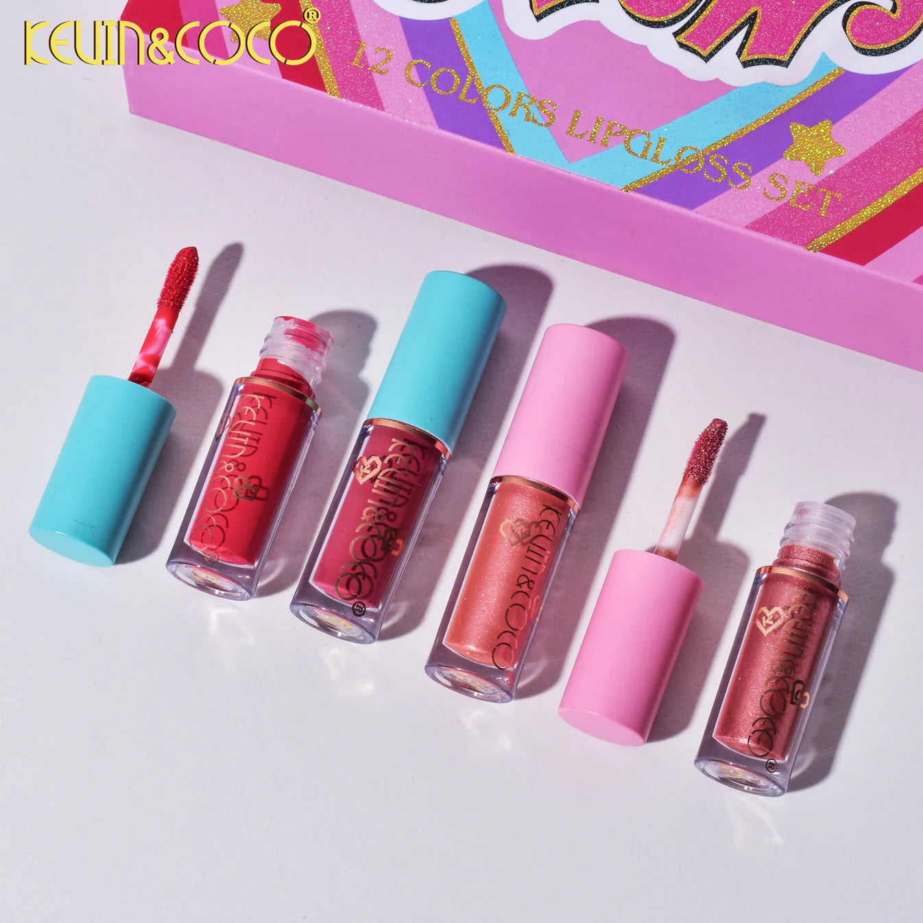 Set 12 Lip Gloss Kevin&amp;Coco, nuante de rosu si rose, cutie dreptunghiulara, 26.5x16.5x2.2 cm, 200 g, multicolor