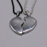 Antique broken heart shape silver locket with silver & black chainantique broken heart shape silver locket with silver & black chaing