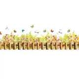 Hyggelig wallsticker med et lille hegn, blomster, sommerfugle mm size  50x70cm Am 7077