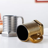 Screw Shape Ceramic Coffee Mug: Unique 3D Porcelain Tea Cup with Sculptural Twist Design.